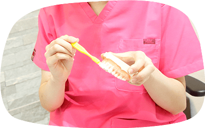 歯ブラシ指導する画像